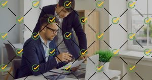 Two CFOs working on finance reviews